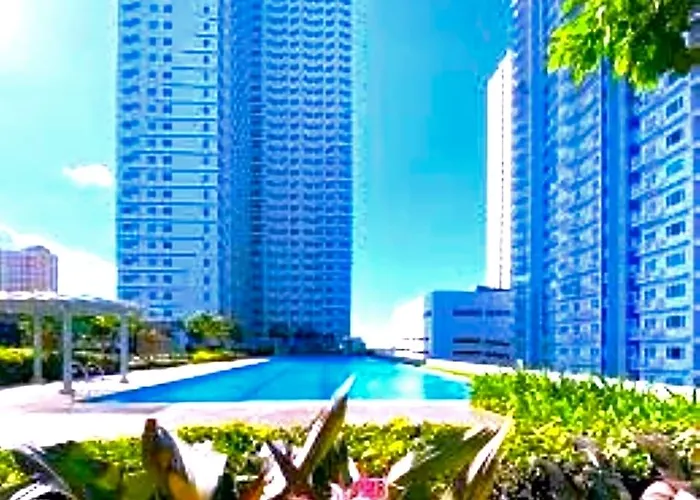 Отель Tropicana Grass Residences Mrt Nlex Sm North Shopping District