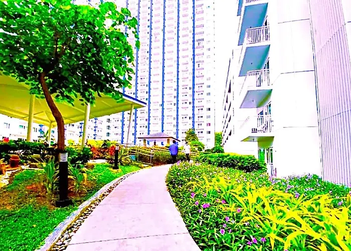 Отель Tropicana Grass Residences Mrt Nlex Sm North Shopping District