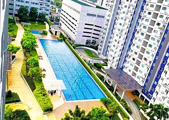 Отель Tropicana Grass Residences Mrt Nlex Sm North Shopping District