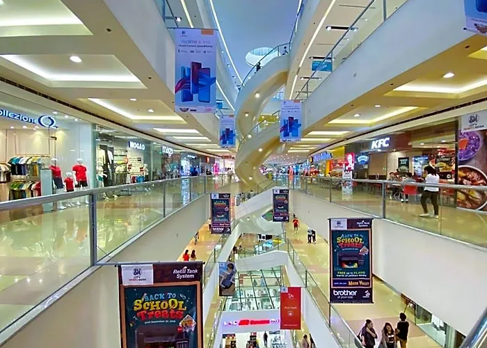 Отель Tropicana Grass Residences Mrt Nlex Sm North Shopping District